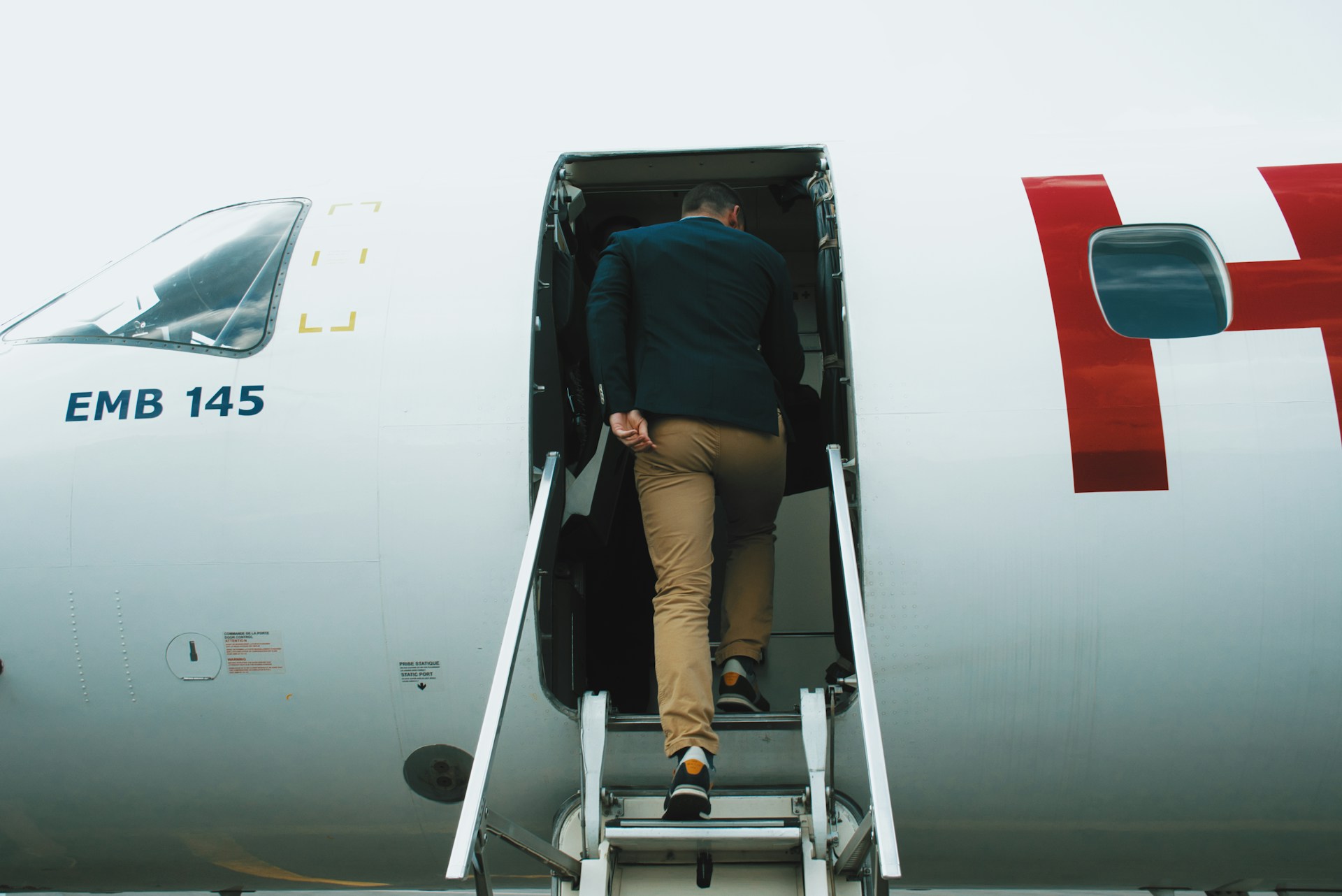 man-entering-plane
